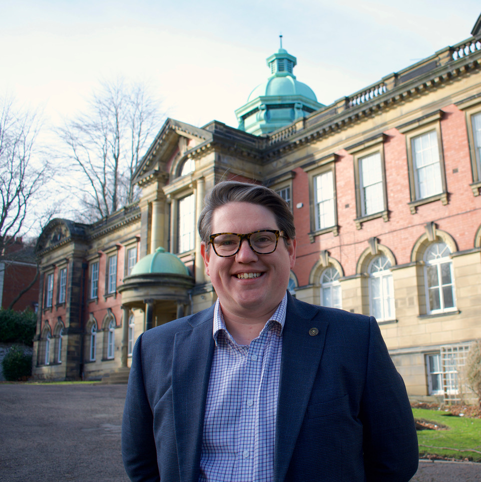 Nick Malyan standing outside of Durham Miners hall