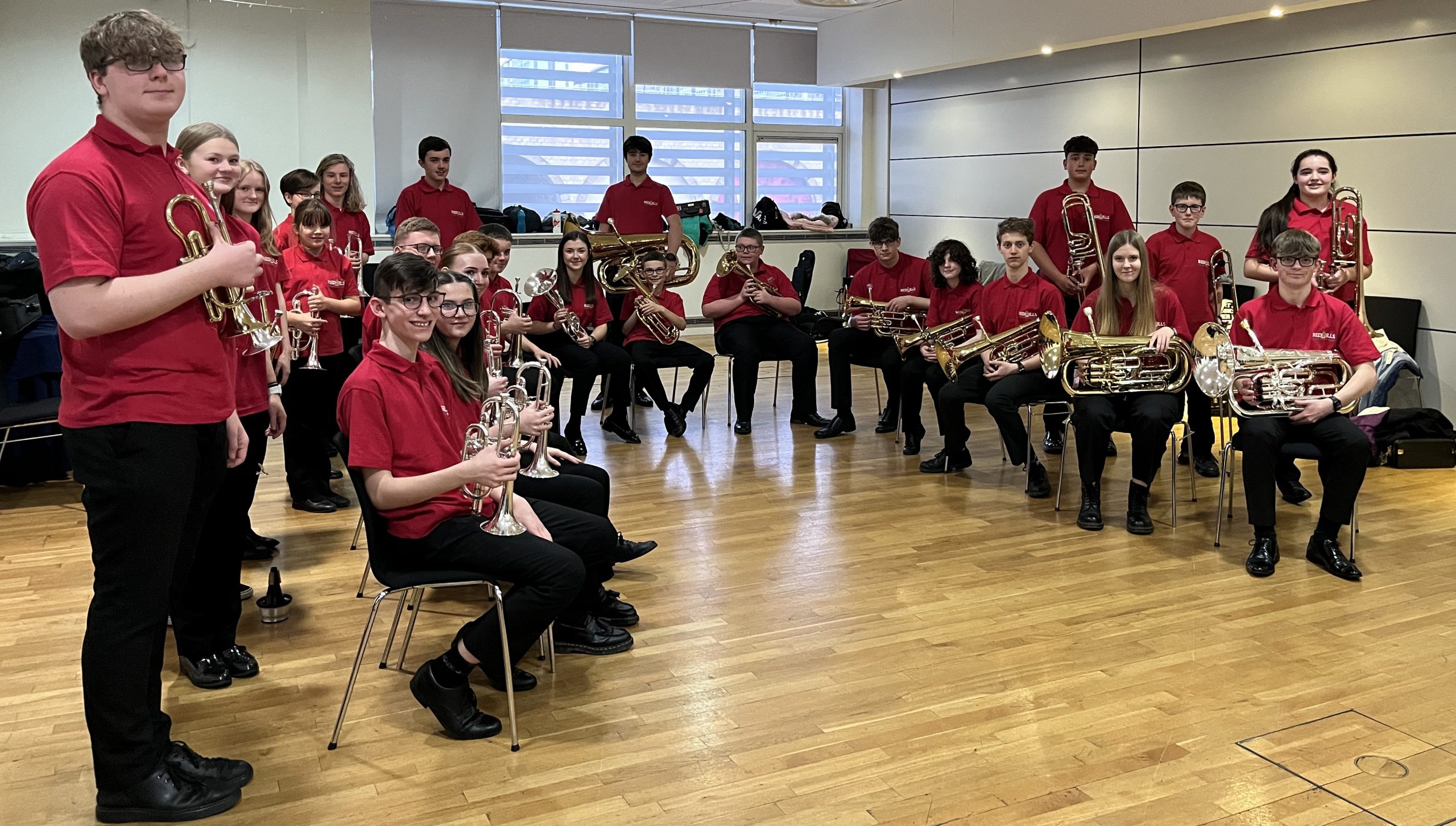 redhills youth brass band outside gala theatre